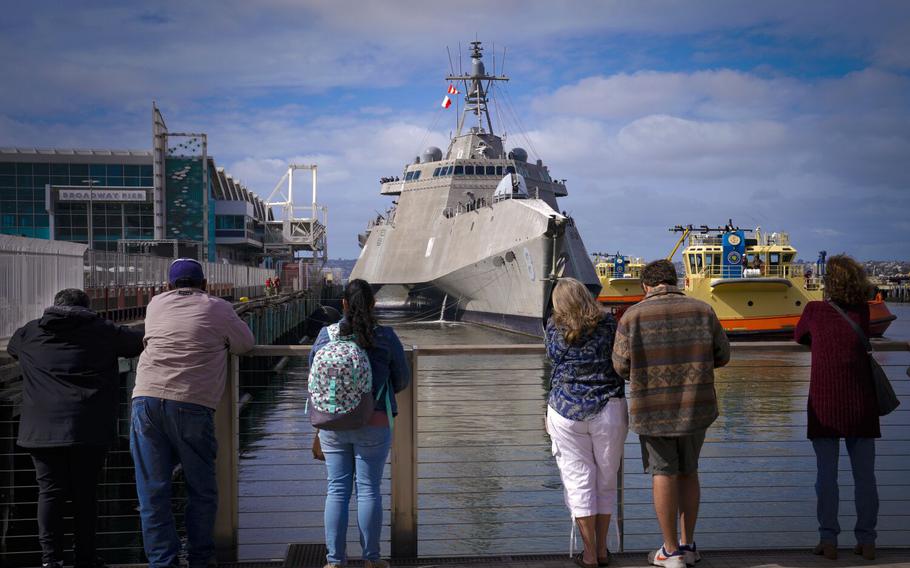 The USS Montgomery (Independence-class littoral combat ship) pulls up and prepares to tie-up on the north side of the pier in San Diego on Nov. 2, 2022. U.S. service members were setting up several static displays in preparation for Fleet Week in San Diego. 