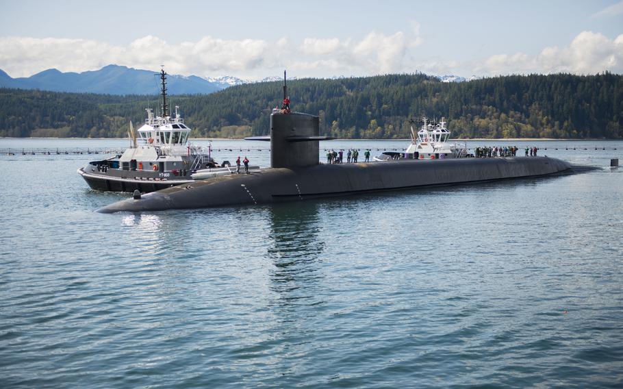 The Ohio-class ballistic missile submarine USS Henry M. Jackson arrives to its homeport at Naval Base Kitsap, just west of Seattle, following a strategic deterrent patrol, April 4, 2018. 