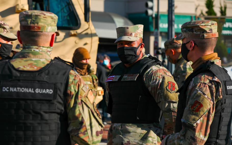 Airmen with the District of Columbia National Guard occupy positions on the street near the U.S. Capitol on Jan. 13, 2021. As many as 700 National Guard troops have been activated to assist Washington law enforcement with traffic control through March 7 as several planned trucker protests make their way to the U.S. capital in the coming weeks, according to the Pentagon.