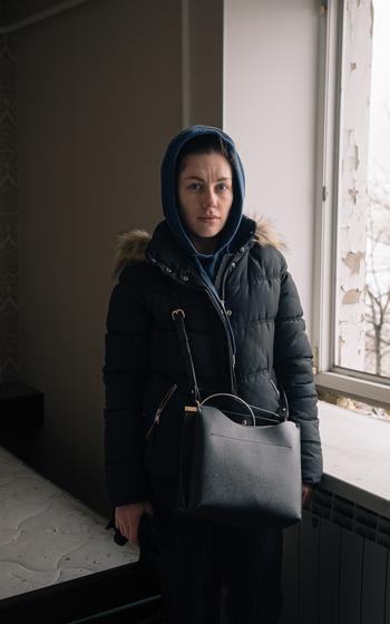 Sasha Terekhovich narrowly survived an airstrike in Kharkiv. Her apartment was badly damaged, and her neighbors were killed or buried under rubble.