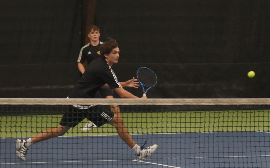 Stuttgart’s Noah Shive chases the ball during the doubles semifinals alongside teammate Zach Call at the DODEA European tennis championships on Friday, Oct. 21, 2022, in Wiesbaden, Germany. The Stuttgart duo beat Vicenza’s Sam Grady and Andrew Reed to reach the finals.