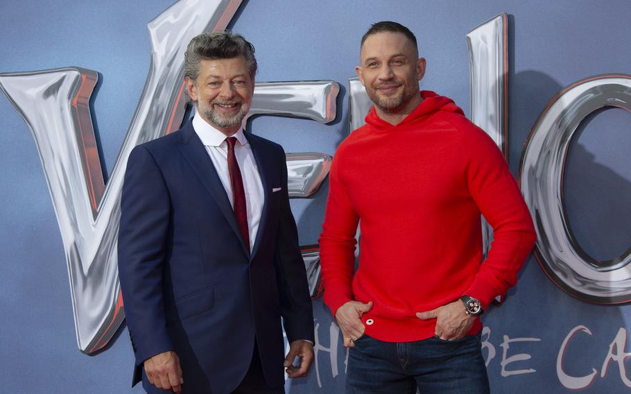 Actor Tom Hardy, right, and director Andy Serkis appear during a photo call for their film “Venom: Let There Be Carnage” at a screening in central London on Tuesday, Sept. 14, 2021. 