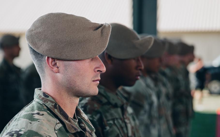 New Army Rangers don their tan berets after graduating a Ranger Assessment and Selection Program course at Fort Moore, Ga., in March 2023. 