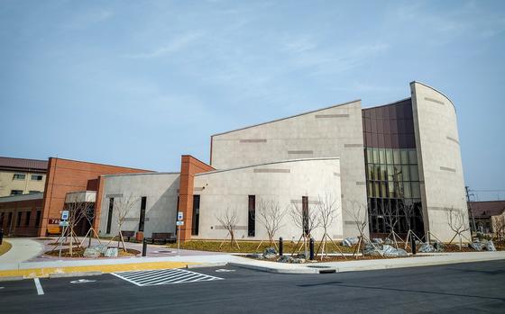 The new chapel at Osan Air Base, South Korea, replaces its worn-out, demolished predecessor with a sanctuary that seats 306 and room for overflow.