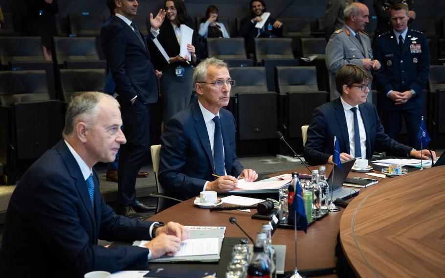 NATO Secretary-General Jens Stoltenberg, center, provides opening remarks during a meeting of allied defense ministers in Brussels, June 15, 2022. NATO is expected to adopt plans for a larger forward-based presence on its eastern flank.