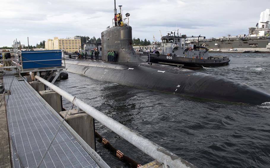 The fast-attack submarine USS Connecticut departs Naval Base Kitsap-Bremerton, Wash., May 27, 2021.