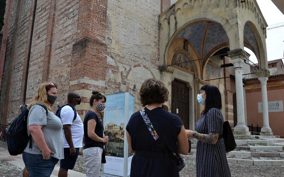 American newcomers to the U.S. Army community in Vicenza, Italy, get a taste of Bassano del Grappaa during a cultural integration class in June 2021. Up to now, Italy has recognized U.S.-issued COVID-19 immunization cards. But it's unclear whether they'll be recognized when new rules take effect requiring a so-called green pass for people to eat inside restaurants or go to movie theaters, gyms and other venues. 