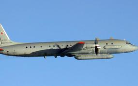 A Russian plane flying in the air.