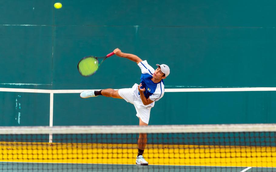Yokota's Ryunosuke Roesch serves against Robert D. Edgren's Charles Alvey. Roesch won his singles match 8-0 and the Panthers as a team beat the Eagles 6-0.