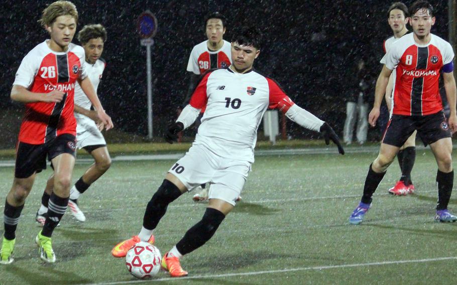 Nick Moore tries to elude defenders.