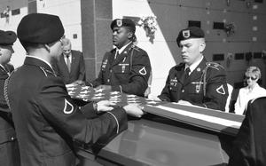 Hed: Ensuring final honors for all, 2012

Wichita, Kansas, Sep. 12, 2012: The Honor Guard from Ft. Riley folds the flag that draped a homeless veteran's casket at his funeral. Instead of being buried in a pauper’s grave — an ending that would have only reinforced his anonymous last years — the Vietnam veteran was again recognized as Army Sgt. Patrick Dunagan and honored with a military funeral.

Read about the charitable efforts of many organizations and businesses to ensure destitute veterans are buried with honor and dignity here.
https://www.stripes.com/news/2012-09-18/military-burials-bring-final-dignity-to-homeless-veterans-2246516.html1

META TAGS: funeral services; burial; military; homeless veterans; charity; 