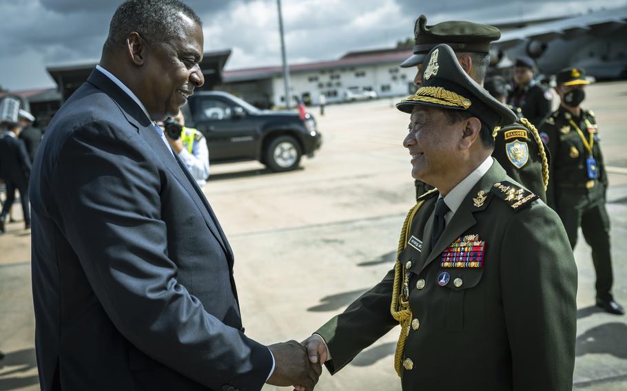Secretary of Defense Lloyd J. Austin III bids farewell to Cambodian Secretary of State Gen. Neang Phat at the conclusion of the 9th Association of Southeast Asia Nations Defense Ministers (ASEAN) Meeting-Plus in Siem Reap, Cambodia, Wednesday, Nov. 23, 2022. 