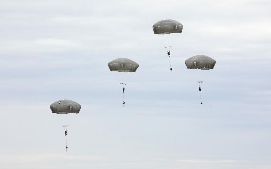 Soldiers make a jump at Malamute Drop Zone at Joint Base Elmendorf-Richardson, Alaska, on Aug. 8, 2023.