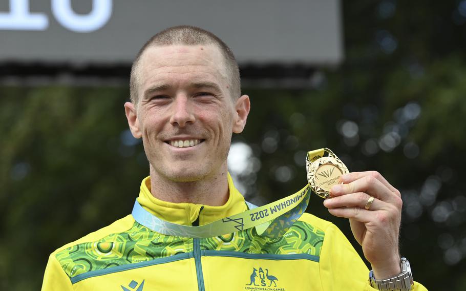 Gold medal winner Rohan Dennis of Australia poses with his medal after the men's cycling individual time trials at the Commonwealth Games in West Park, Wolverhampton, England, on Aug. 4, 2022. Dennis was reported to have been charged in connection with the death of his wife, Olympic cyclist Melissa Hoskins, who died after being struck by a vehicle while riding in Adelaide.