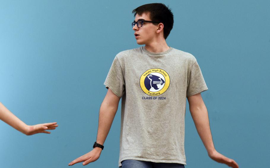 Andrew Quinn dances during a rehearsal for "Mean Girls Jr." at Yokota High School on Yokota Air Base, Japan, April 24, 2024. 