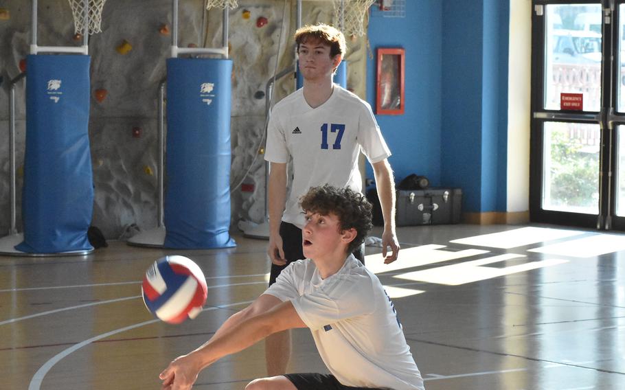 Hohenfels’ Gavyn Jett crouches to return a shot during the Tigers’ match with American Overseas School of Rome in pool play on Friday, Oct. 28, 2022. The Tigers won the first set in  boys volleyball in school history during the match.

Kent Harris/Stars and Stripes