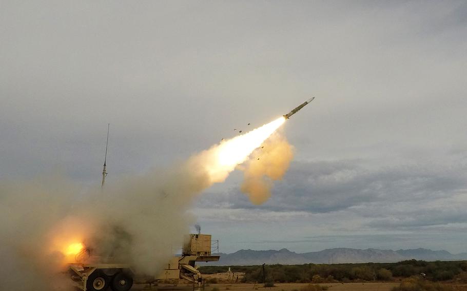 A missile is fired in the desert.