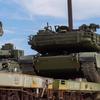 FORT CAVAZOS, TEXAS - One of the first U.S. Army tanks bound for Washington, D.C. and the Army's 250th Birthday Parade is loaded onto a rail car at Fort Cavazos May 21. Each tank weighs around 140,000 pounds. (U.S. Army photo by Sgt. Jose Escamilla).