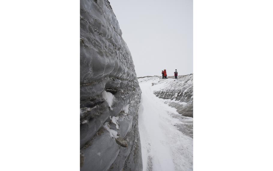 The edge of the Greenland ice sheet, very near Thule.  The reporter was invited on a hike the day before by a Danish doctor he met just walking on the base.