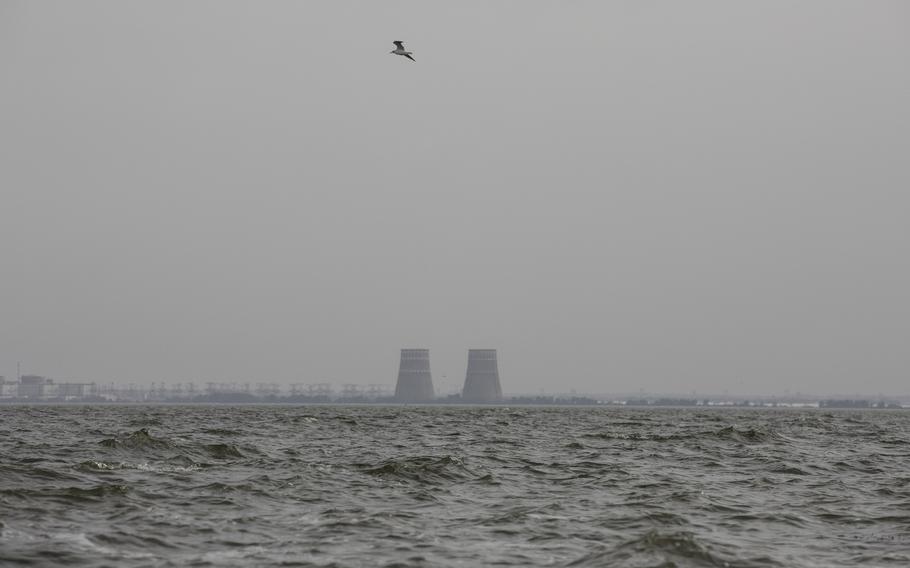 The Zaporizhzhia nuclear complex, occupied by Russian forces, is seen from across the Dnieper River in Chervonohryhorivka, Ukraine, on Aug. 15, 2022. 