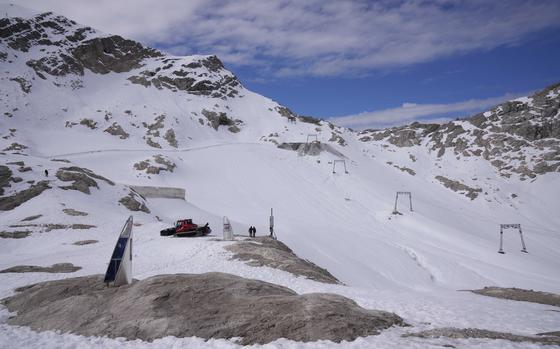 FILE - Snow covers the Schneeferner glacier near the top of Germany's highest mountain 'Zugspitze' (2962 meters) near Garmisch-Partenkirchen, Germany, Tuesday, Oct. 18, 2022. A man has died after being hit by lightning near the summit of Germany's highest peak, police said Monday, July 22, 2024. (AP Photo/Matthias Schrader, File)