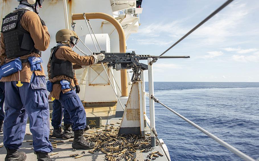 Crew members on the Coast Guard Cutter Stratton are seen during weapons training in a  Dec. 20,  2022 post.