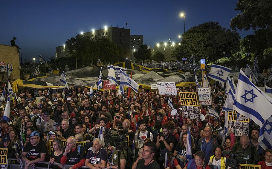 Israelis protest against a budget proposed by Prime Minister Benjamin Netanyahu’s government ahead of a parliamentary vote and its plans to overhaul the country’s judicial system in Jerusalem, Tuesday, May 23, 2023.