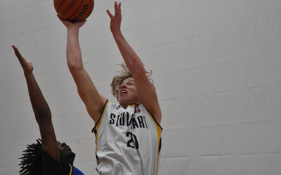 Stuttgart’s Jacob Schudel scores against Wiesbaden in a Division I semfinal game Friday, Feb. 16, 2024, at the DODEA European Basketball Championships in Wiesbaden, Germany.