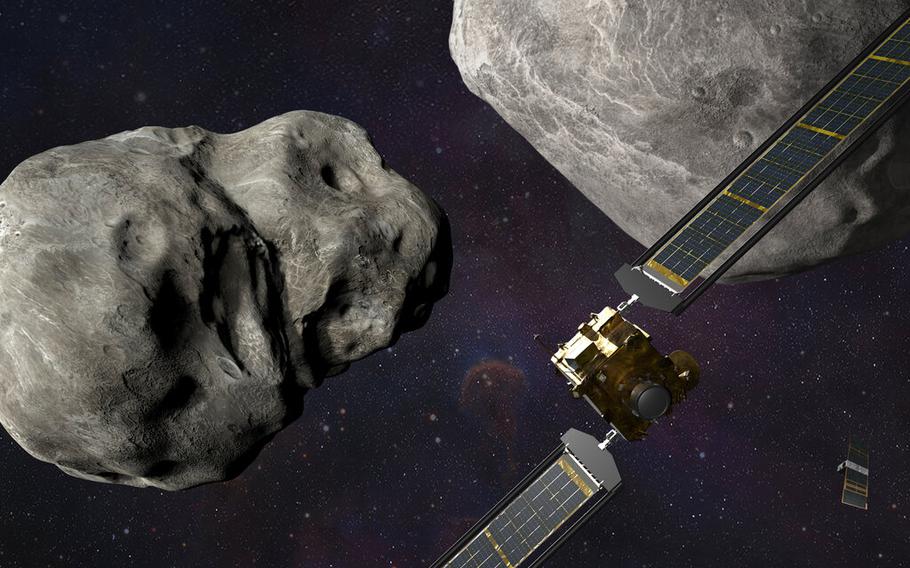 An illustration depicts NASA’s DART probe, foreground right, and Italian Space Agency’s LICIACube, bottom right, at the Didymos system before impact with the asteroid Dimorphos, left. DART is expected to zero in on the asteroid Monday, Sept. 26, 2022.
