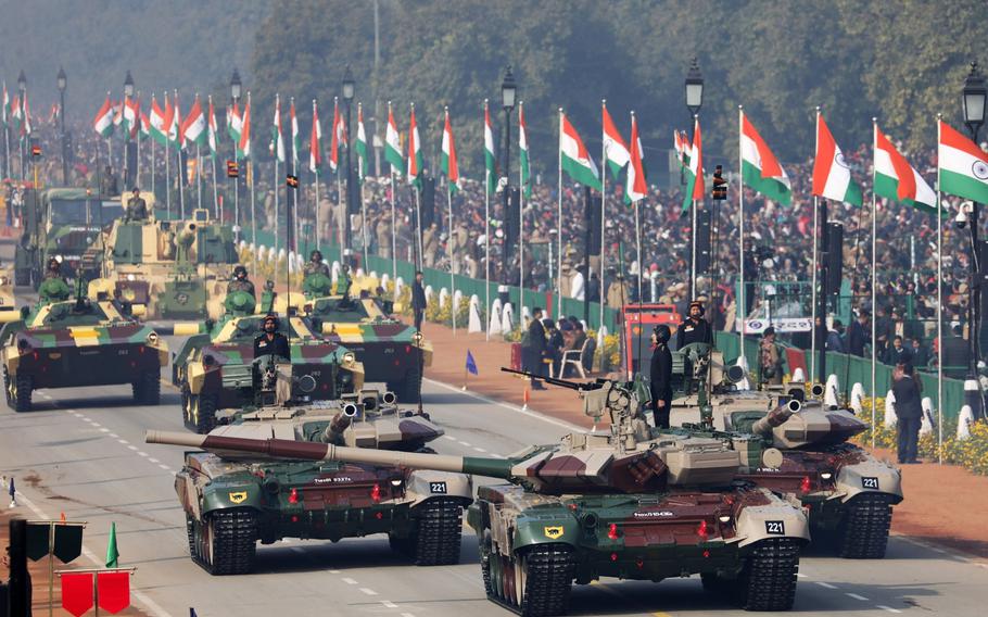 Indian Army T-90 tanks move along the Rajpath during the Republic Day parade in New Delhi on Jan. 26, 2020. 