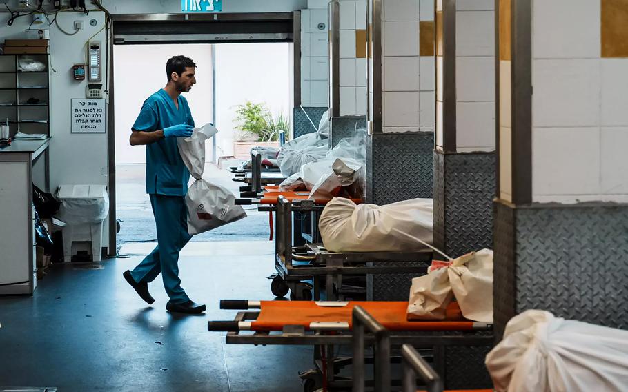 Nir Blatman organizes an incoming shipment of human remains at the Institute of Forensic Medicine in Tel Aviv.