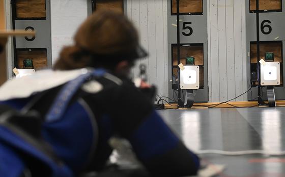 Ansbach marksmanship team captain Alexander Pohlman sights in during the test shots for the prone position before the scoring period commences during the DODEA-Europe marksmanship competition at Vilseck High School on Dec. 9, 2023. 