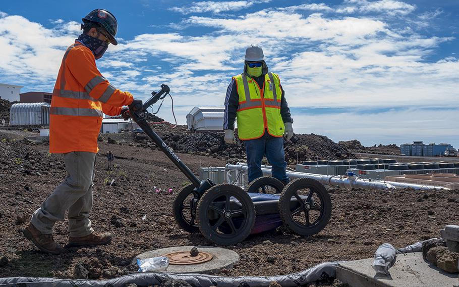 Contractors use a ground-penetrating radar to identify and map utility pipes and wires under the ground at the Maui Space Surveillance Complex on the island of Maui, Hawaii on Feb. 21, 2023. After mapping utilities under the ground, contractors will excavate soil around the generator which was contaminated during a recent fuel spill.