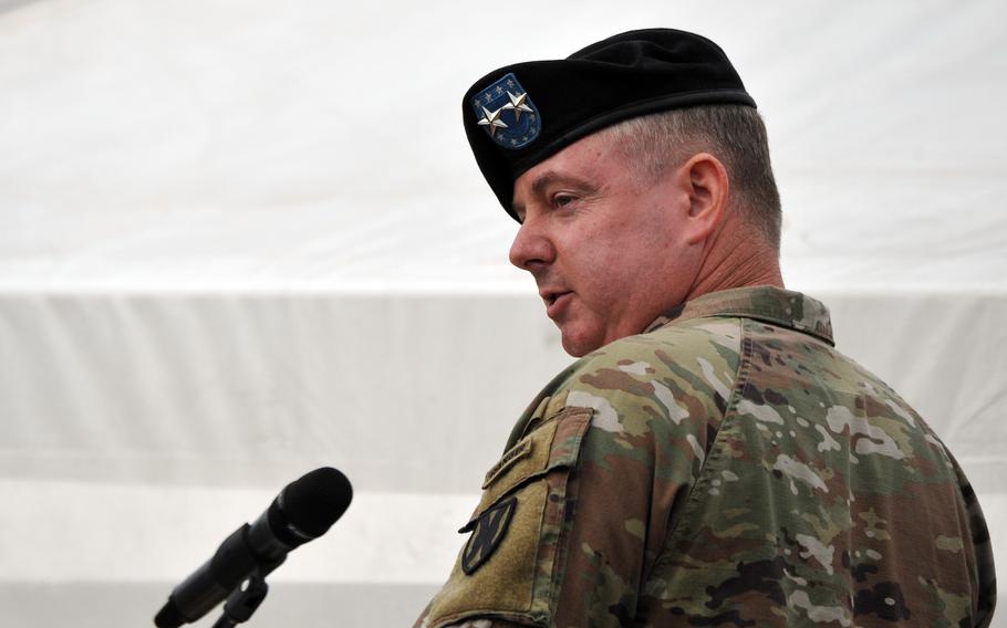 The outgoing commander of the 21st Theater Sustainment Command, Maj. Gen. Christopher Mohan, gives his farewell speech after turning over command to Brig. Gen. James Smith at Daenner Kaserne, Kaiserslautern, Germany, June 8, 2021. 