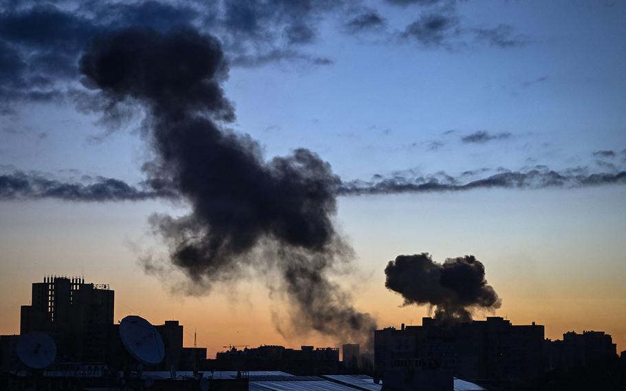 This photograph taken on March 16, 2022, shows smoke rising after an explosion in Kyiv, Ukraine. Several explosions rocked Kyiv early March 16, according to AFP journalists in the city. The blasts came as Russia intensified its attacks on the Ukrainian capital, which was placed under curfew late March 15 due to what its mayor called a "difficult and dangerous moment."