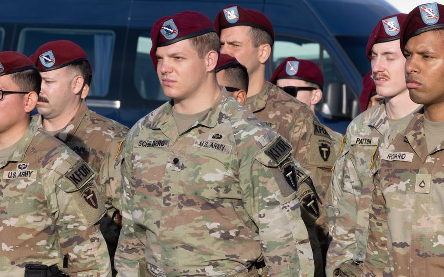 American soldiers listen to NATO Secretary-General Jens Stoltenberg during his visit with Kosovo Force troops in Kosovo, Nov. 20, 2023.