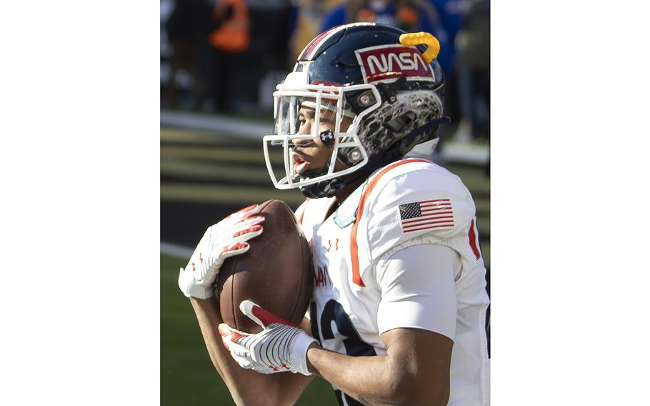 Navy slotback Vincent Terrell, Jr., catches a punted football during warm-ups prior to the start of the 123rd Army-Navy football game held at Philadelphia’s Lincoln Financial Field stadium on Dec. 10, 2022.