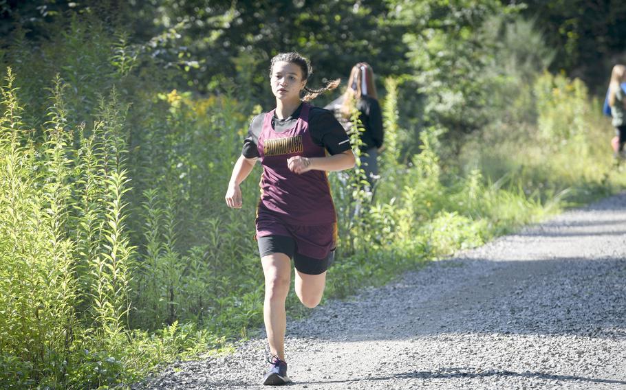 Kaleena Sais, a runner at Baumholder, charges down the final stretch of a high school girls’ varsity cross country meet Saturday, Sept. 18, 2021, in Kaiserslautern, Germany.