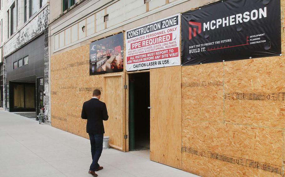 Matt McPherson, owner of Topeka, Kansas-based McPherson Contractors, walks towards an entrance of a project in June 2019. McPherson who had pleaded guilty to a scheme that involved companies defrauding the government by receiving $346 million for contracts set aside for veterans and minorities, was sentenced Thursday, Jan. 6, 2022.
