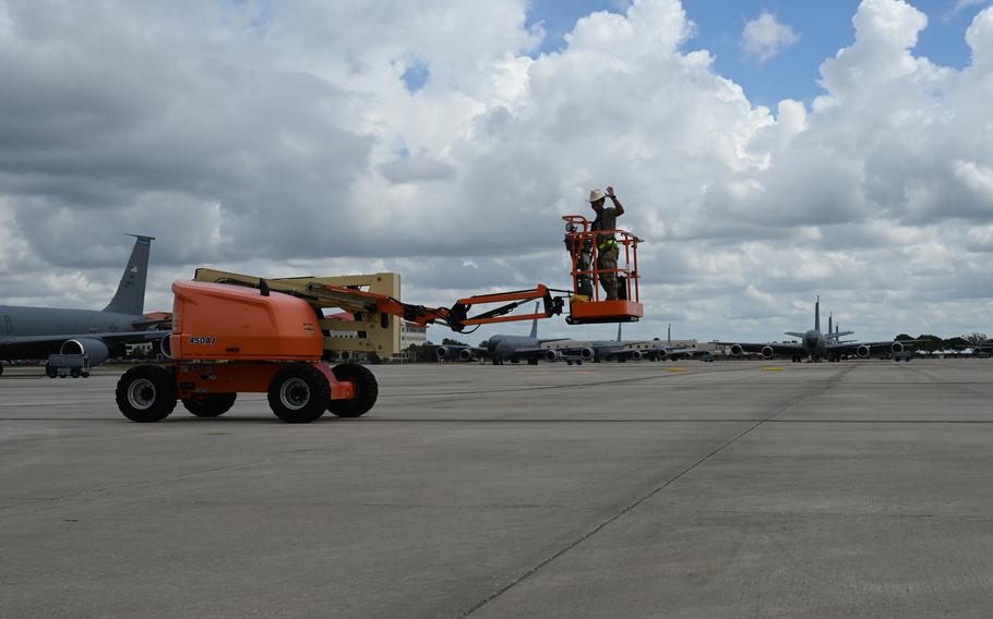 U.S. Air Force Senior Airman Isaac Rivera-Molina, an isochronal inspections craftsman assigned to the 6th Aircraft Maintenance Squadron, transports a lift to a safe location at MacDill Air Force Base, Fla., Aug. 28, 2023. Machinery on base was moved to safe locations in preparation for Tropical Storm Idalia.