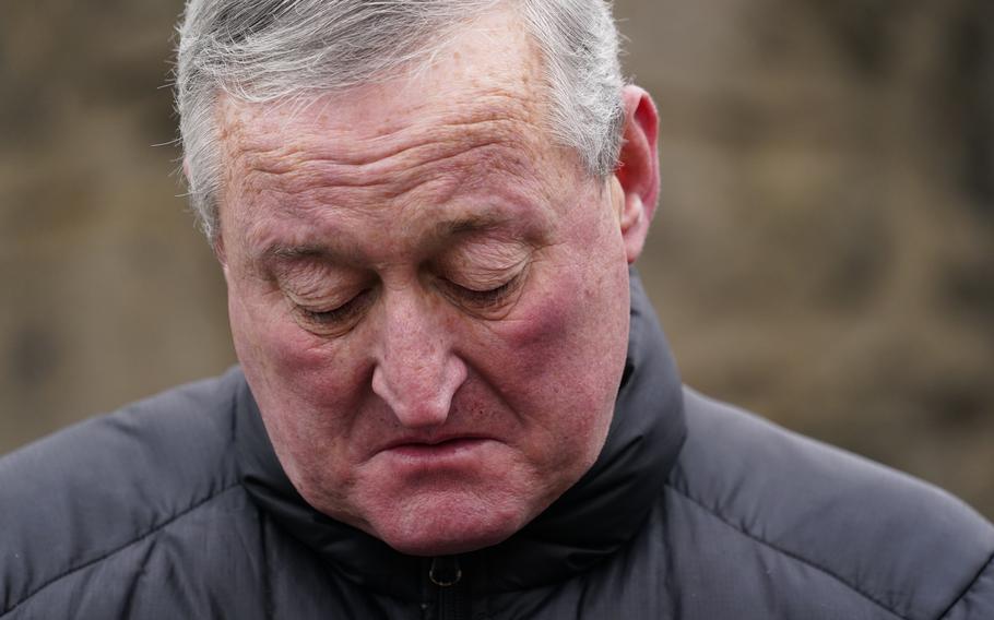 Philadelphia mayor Jim Kenney pauses while speaking at a news conference near the scene of a deadly row house fire, Wednesday, Jan. 5, 2022, in the Fairmount neighborhood of Philadelphia.  