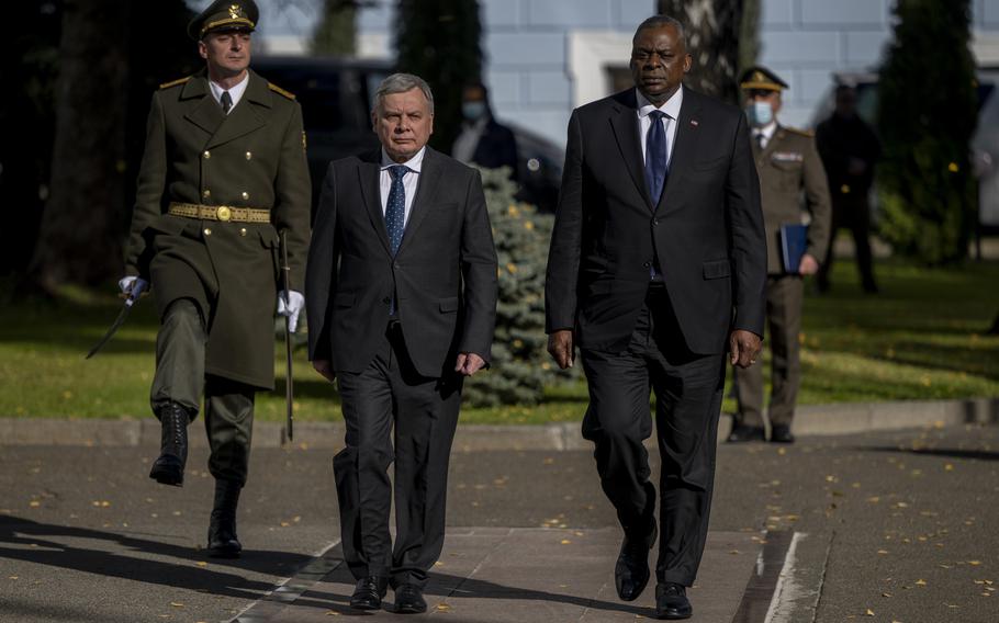 Defense Secretary Lloyd J. Austin III is welcomed by Ukrainian Defense Minister Andriy Taran in Kyiv, Ukraine, Oct. 19, 2021. Austin visited allies in Georgia, Ukraine and Romania recently to reaffirm U.S. support. Russia has massed troops near Ukraine's border on multiple occasions this year, U.S. and NATO officials have said.