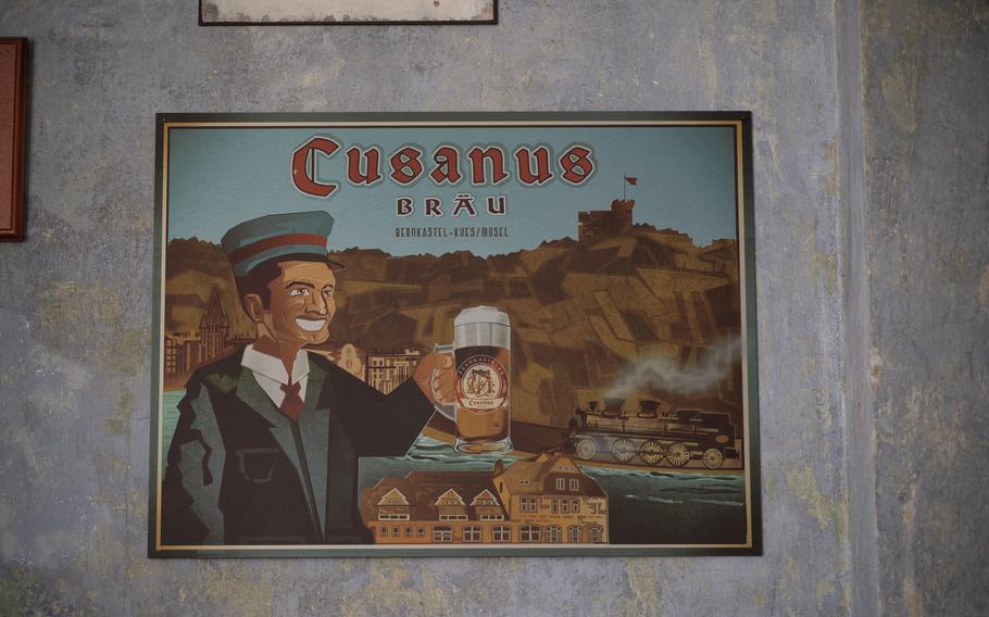A sign promoting a German beer named after a cardinal.