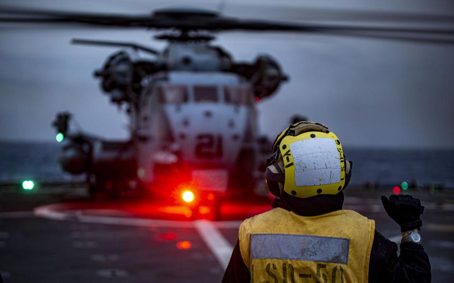 A CH-53E Super Stallion with the 24th Marine Expeditionary Unit awaits commands during flight operations on the dock landing ship USS Carter Hall in the Mediterranean Sea, in May 2021. U.S. 6th Fleet stood up Task Force 61/2, a naval amphibious unit comprised of Marines and sailors to coordinate efforts in Europe ranging from port visits to counter-reconnaissance operations, the task force said in a statement April 1, 2022. 