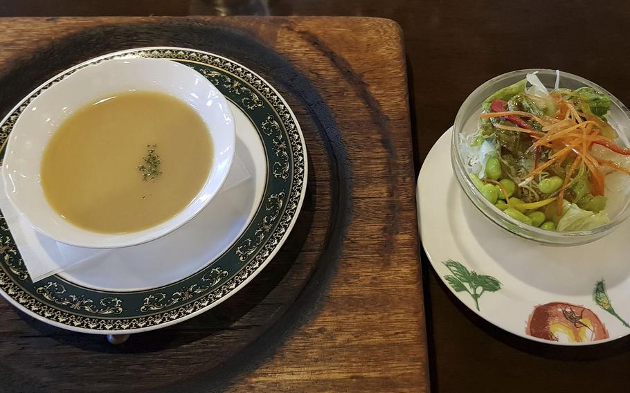 Chilled corn soup and salad are just a couple of the appetizers found at Sherlock Holmes, an eatery specializing in hamburger patties and steak in western Tokyo. 