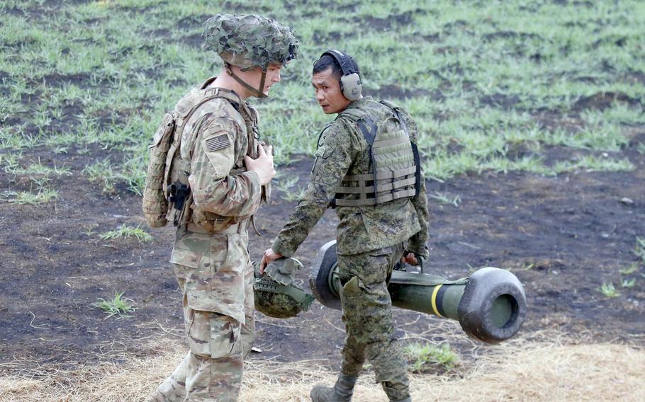 U.S. and Filipino troops take part in a Balikatan drill involving Javelin anti-tank missiles at Fort Magsaysay, Philippines, Thursday, April 13, 2023.