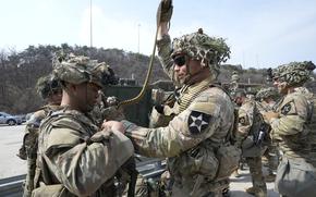 U.S. Army soldiers prepare to participate in a combined live fire exercise between South Korea and the United States at Rodriguez Live Fire Complex in Pocheon, South Korea, Wednesday, March 22, 2023. 