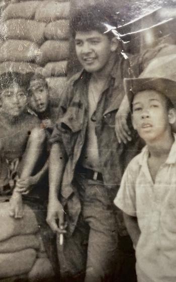 George Bennett with Vietnamese children