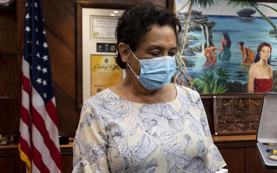 Guam Gov. Lou Leon Guerrero, seen here at her office in May 2020, urged residents to get vaccinated and boosted as the island reported its 305th coronavirus death on Thursday, Feb. 10, 2022. 