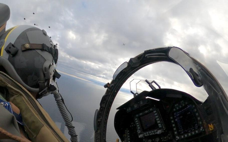 A Spanish F-18 flying over the Baltic Sea tracks a Russian aircraft that NATO officials say wasn't conforming with international air safety regulations. Allied fighter jets scrambled multiple times over the past four days to track and intercept Russian aircraft over the Baltic and Black seas, NATO said in a statement. 